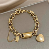 Bracciale spesso con cuori | Oro