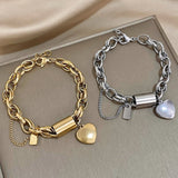 Bracciale spesso con cuori | Oro