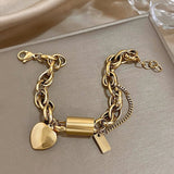 Bracciale spesso con cuori | Oro