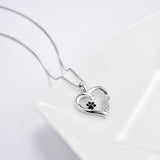 Collana con impronta di zampa e cuore con ciondolo infinito